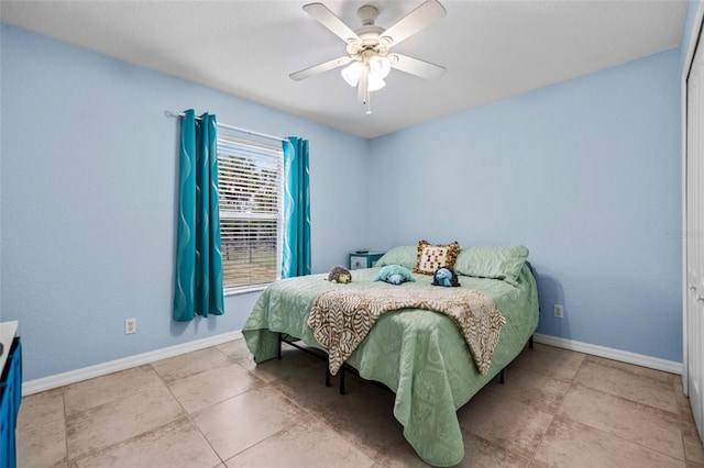 bedroom featuring ceiling fan