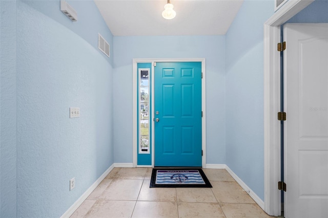 view of tiled foyer entrance