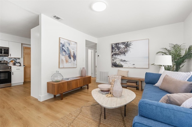 living room featuring light hardwood / wood-style flooring