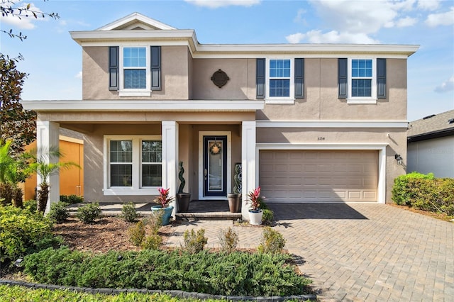 view of front of home with a garage