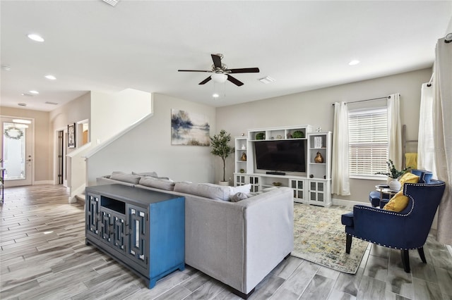 living room with ceiling fan