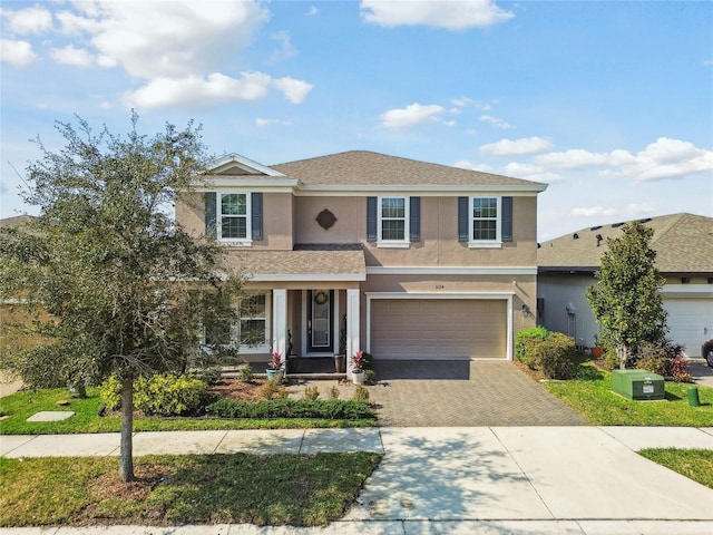 view of property with a garage