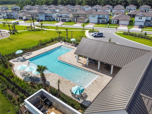 view of swimming pool with a patio area