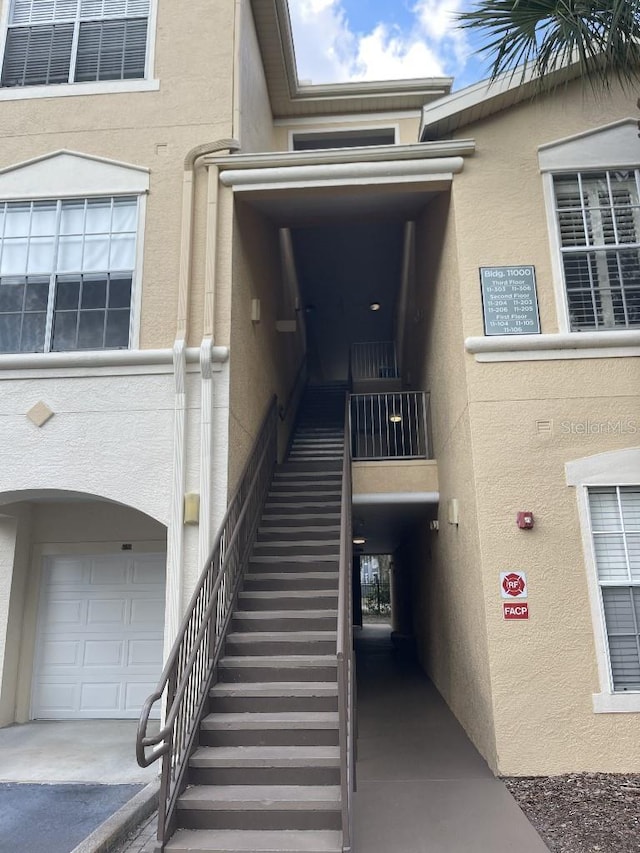 entrance to property featuring a garage