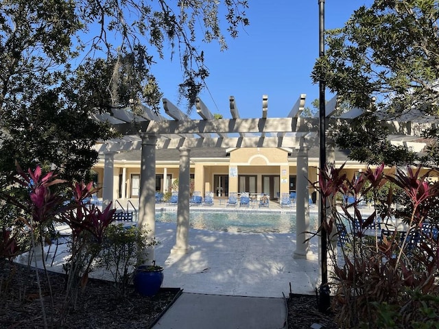 exterior space featuring a pergola and a patio area