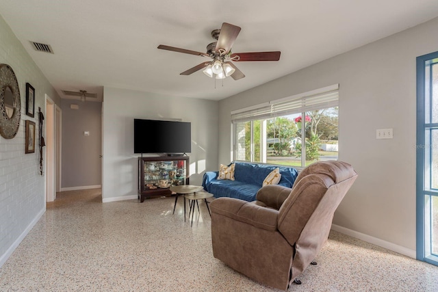 living room featuring ceiling fan