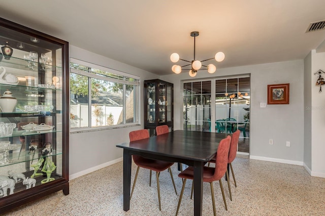 dining room featuring an inviting chandelier