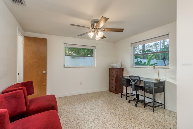 office space featuring ceiling fan