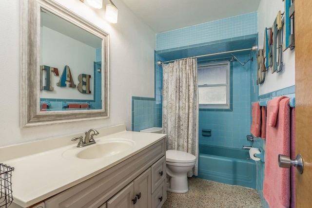 full bathroom featuring vanity, toilet, and shower / bathtub combination with curtain