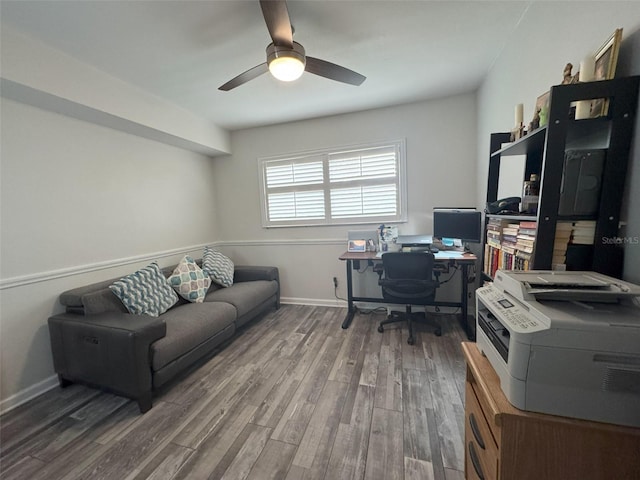 home office featuring ceiling fan and wood-type flooring