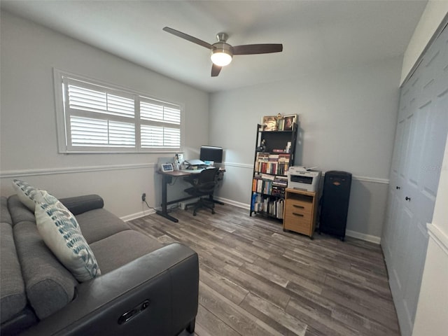 office space with ceiling fan and hardwood / wood-style floors