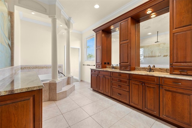 bathroom with ornamental molding, vanity, decorative columns, and tile patterned floors