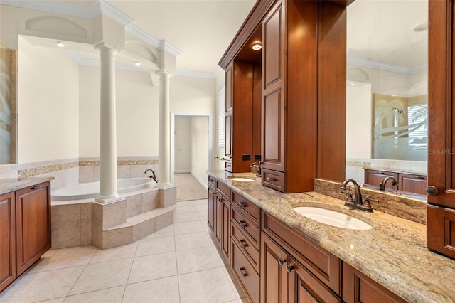 bathroom featuring crown molding, tile patterned floors, vanity, and ornate columns