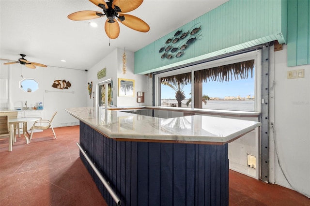 kitchen featuring ceiling fan