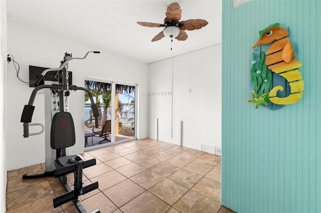 workout area featuring ceiling fan