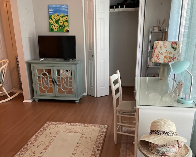 dining space featuring hardwood / wood-style flooring