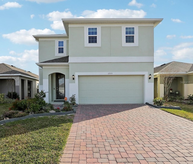 front of property featuring a garage