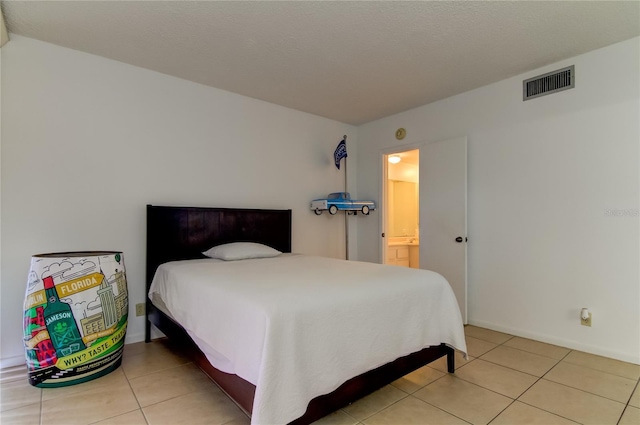 bedroom with light tile patterned flooring