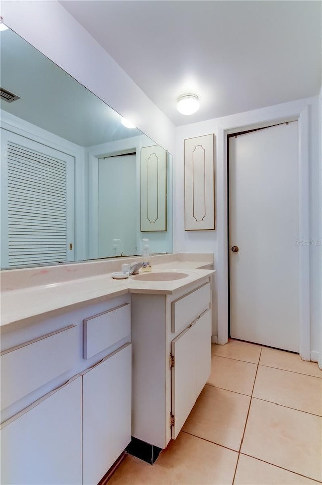 bathroom featuring vanity and tile patterned floors