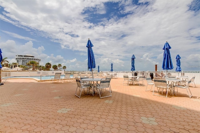 view of patio / terrace with a community pool