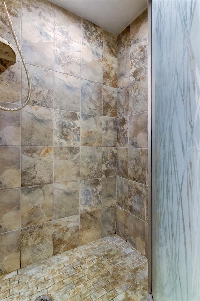 5396 Gulf Blvd Unit 110, St Pete Beach, FL 33706 - full bathroom featuring tiled shower