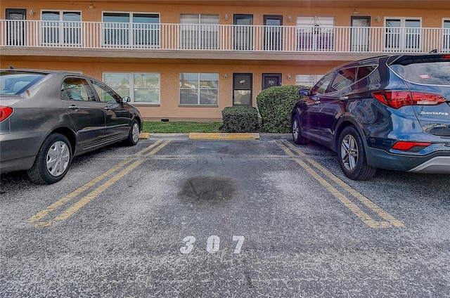 view of uncovered parking lot