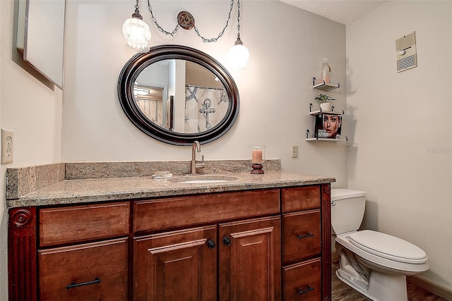 6400 46th Ave N Unit 307, Kenneth City, FL 33709 - bathroom featuring vanity and wood finished floors