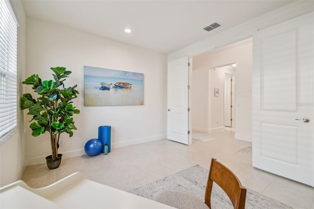 interior space featuring light tile patterned flooring