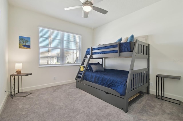 bedroom with ceiling fan and carpet floors