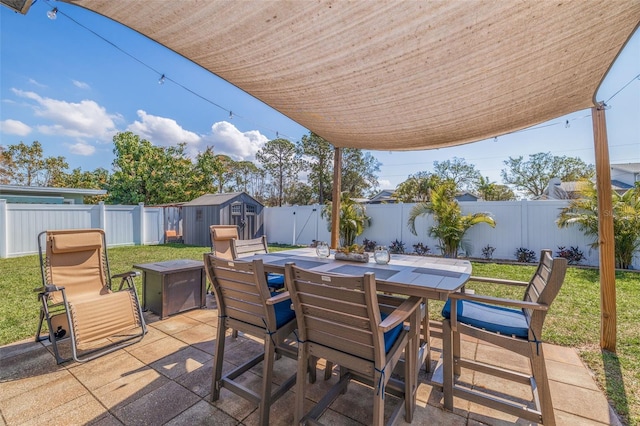 view of patio featuring a storage shed