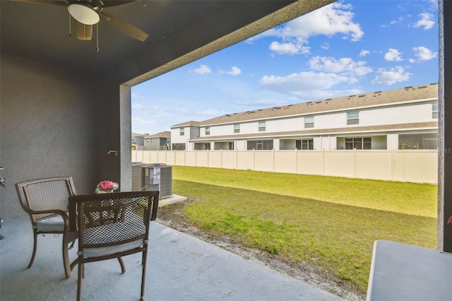 view of patio featuring ceiling fan and central air condition unit