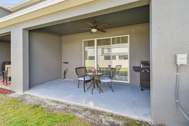 view of patio / terrace with ceiling fan