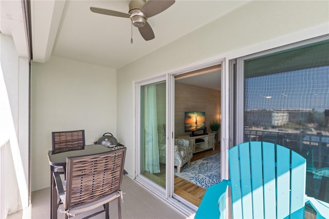 balcony featuring ceiling fan