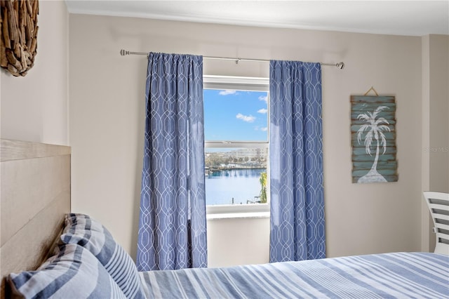 bedroom with a water view