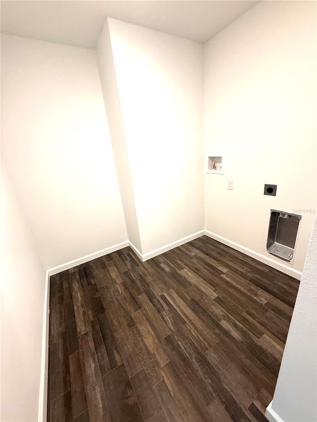 washroom featuring hookup for a washing machine, electric dryer hookup, and dark hardwood / wood-style floors