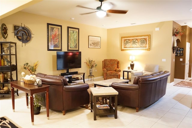 tiled living room featuring ceiling fan