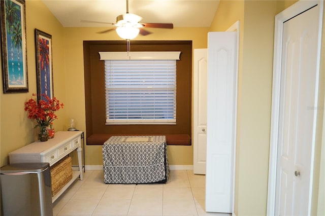 hall with light tile patterned flooring