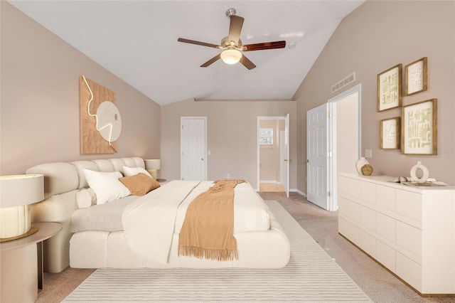 carpeted bedroom with lofted ceiling and ceiling fan