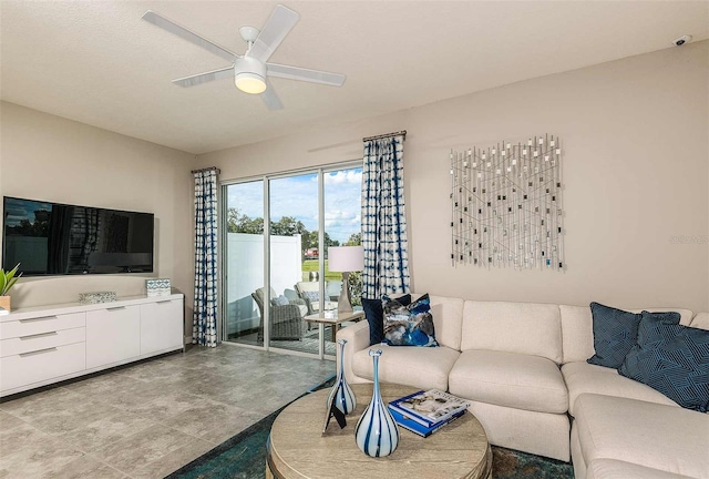 living room featuring ceiling fan