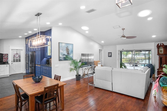 living room with dark hardwood / wood-style flooring, ceiling fan, and lofted ceiling