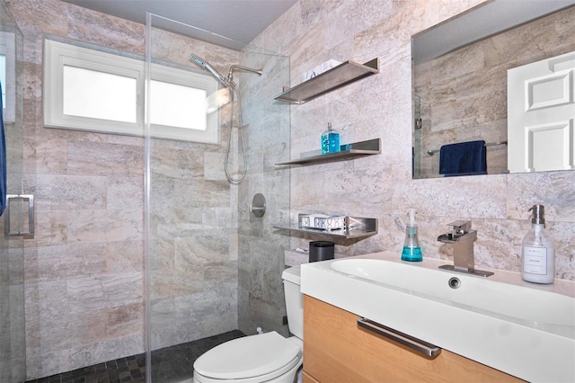 bathroom featuring tile walls, vanity, walk in shower, toilet, and decorative backsplash