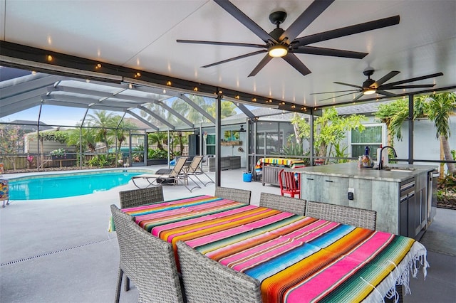 exterior space featuring an outdoor wet bar and a patio area