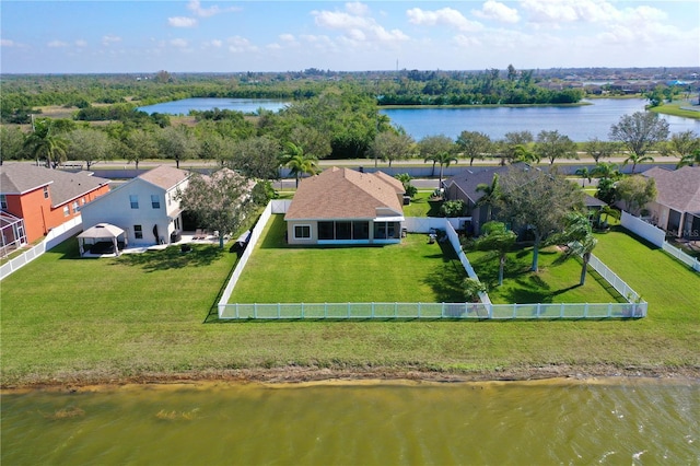 drone / aerial view with a water view