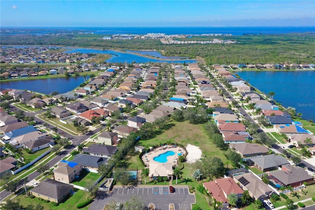 drone / aerial view with a water view