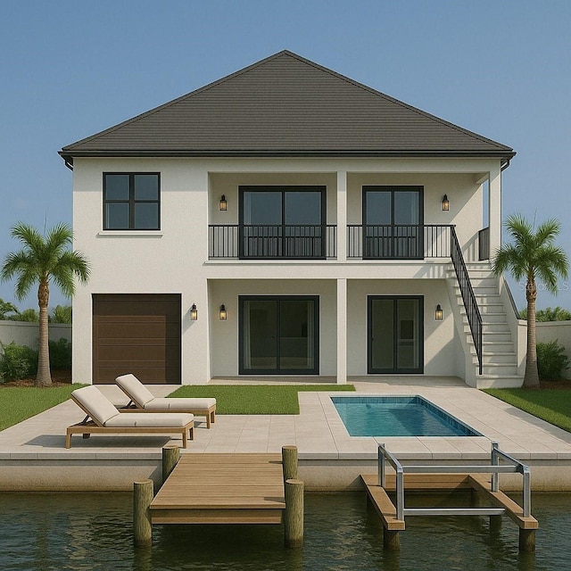 back of property featuring a water view, a patio area, stairway, a balcony, and stucco siding