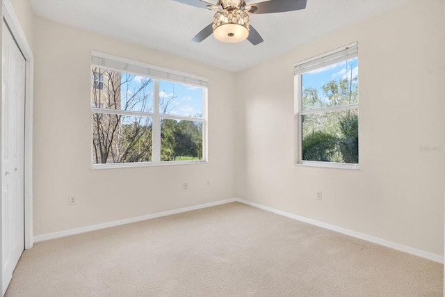 interior space featuring plenty of natural light and ceiling fan