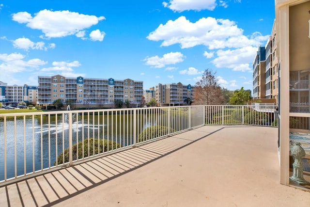 balcony featuring a water view