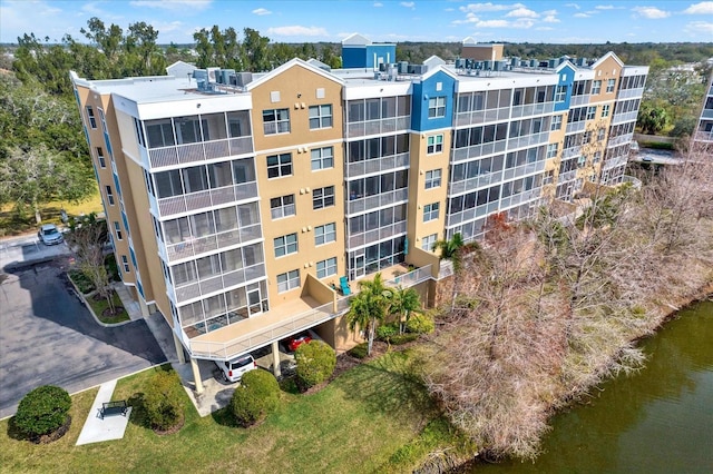 view of building exterior with a water view