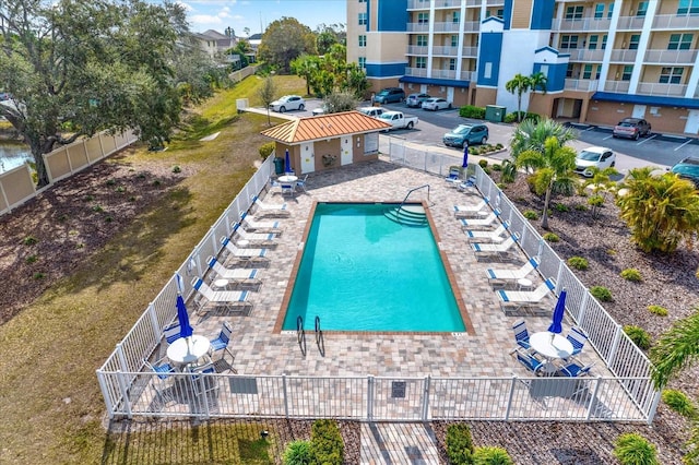 view of swimming pool with a patio area