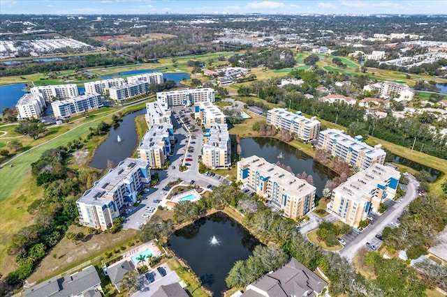 drone / aerial view with a water view